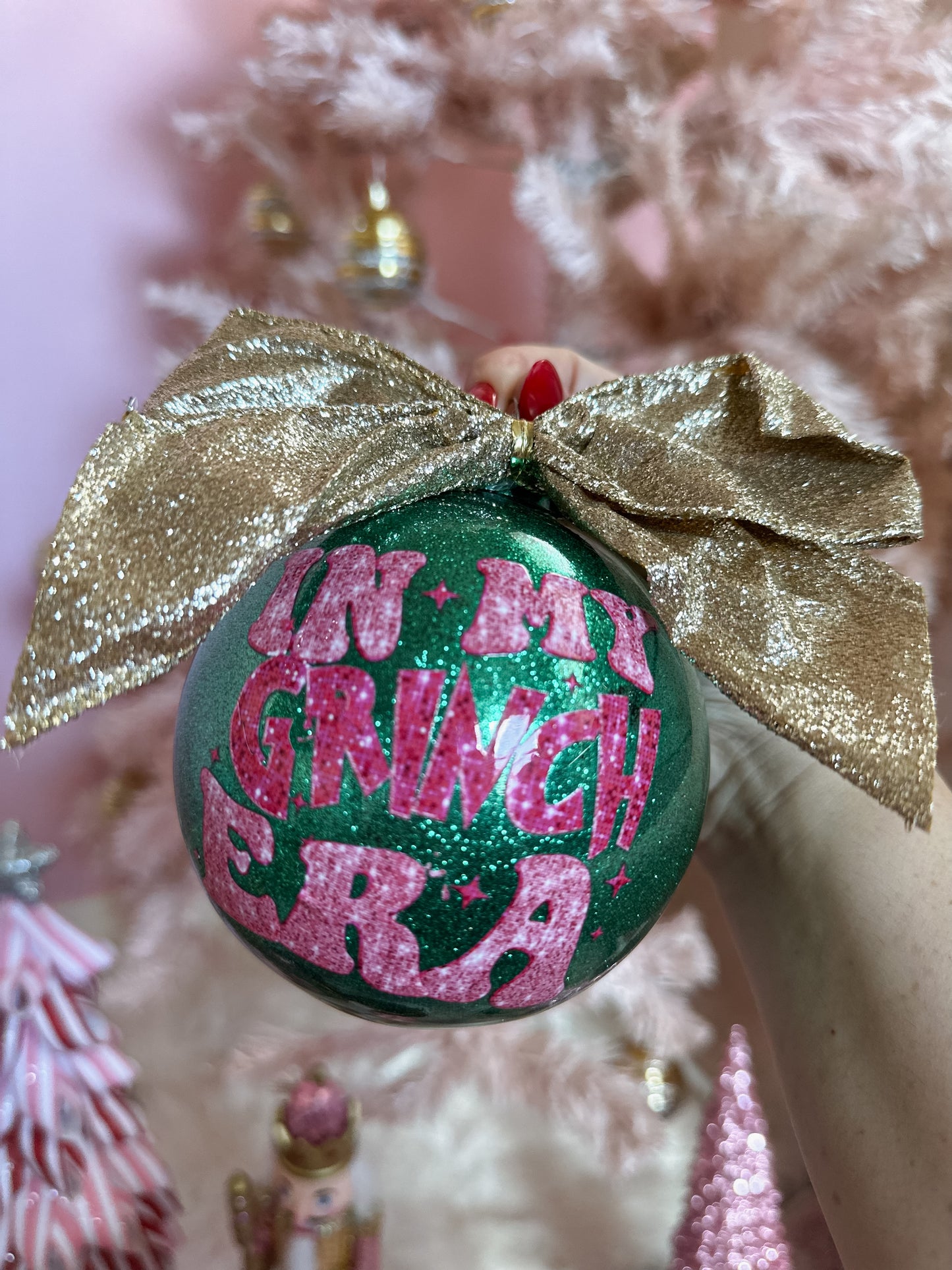 In my Grinch ERA glitter ornament